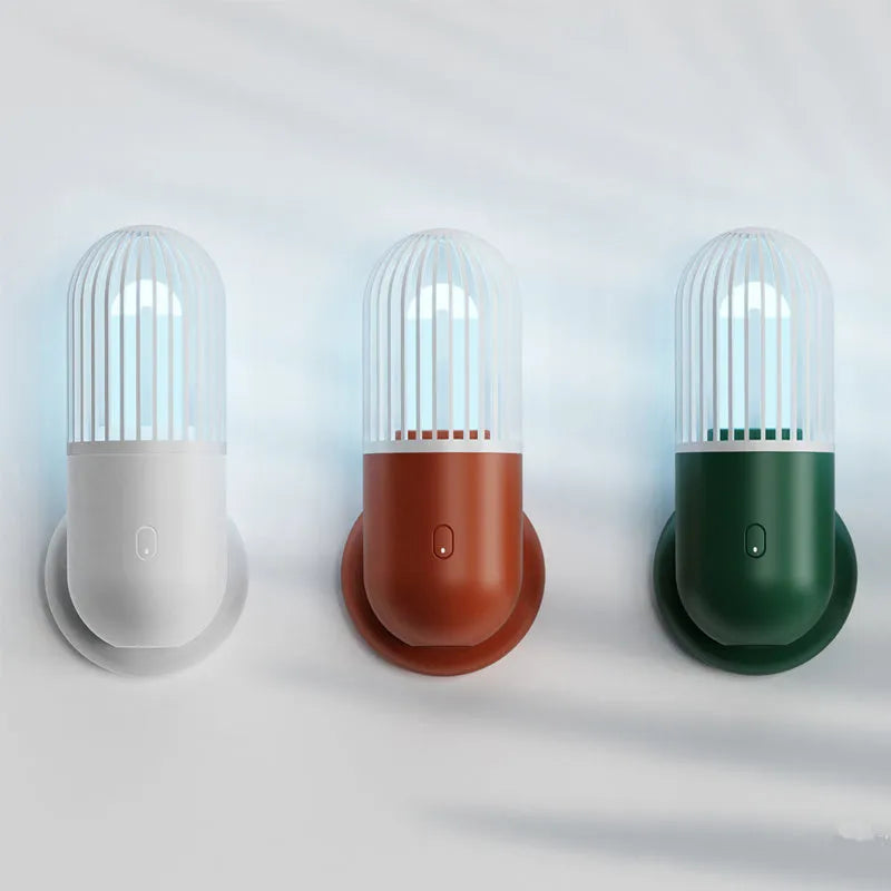 Portable capsule ultraviolet disinfection lamp in black, brown, green or white with compact 52x52x136mm body