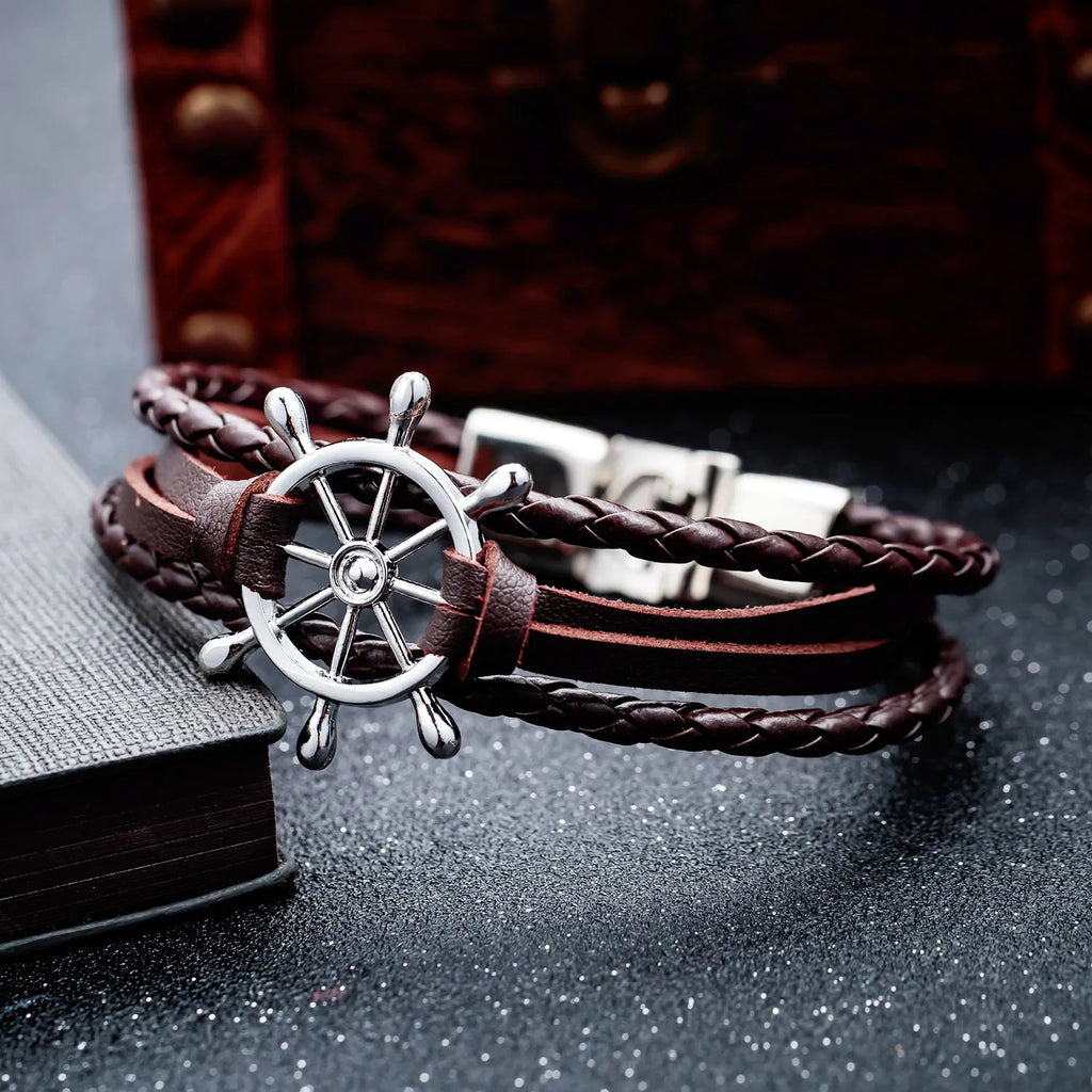 Alloy leather charm bracelet with black clasp fastening in brown colour option