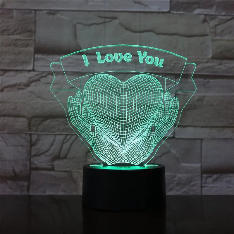 Valentine 3D night light with hands holding heart design in seven colour changing LED modes