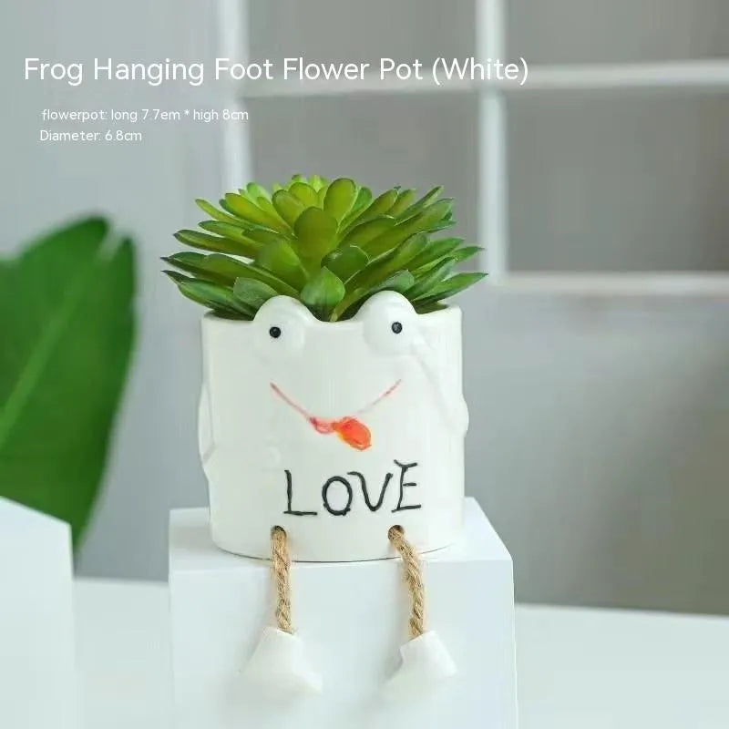 Ceramic hanging foot flowerpot in a cartoon style for desktop succulents.