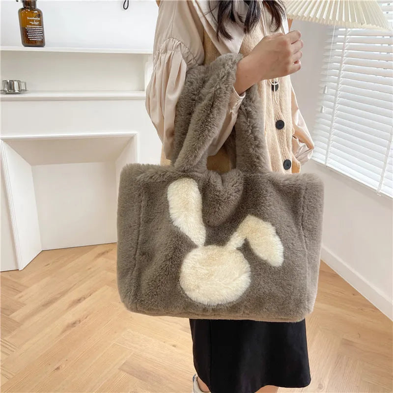 Plush shoulder bag with rabbit ears design in multiple colour options