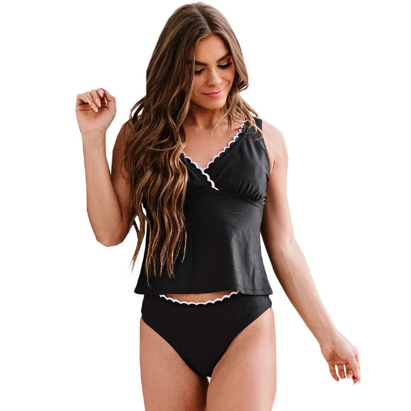 Black women's sleeveless split swimsuit or bikini on a mannequin