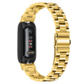 Stainless steel three-bead watch strap for Fitbit Inspire 3 fitness tracker showing adjustable clasp and bead detail