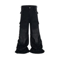 Black washed-out cotton overalls with multiple pockets and a detachable micro-pull design on a hanger.