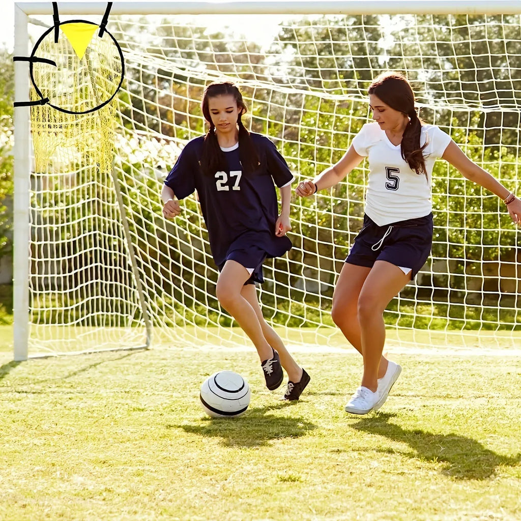 Black portable soccer training goal net set up on grass, showing 130cm square frame and netting.