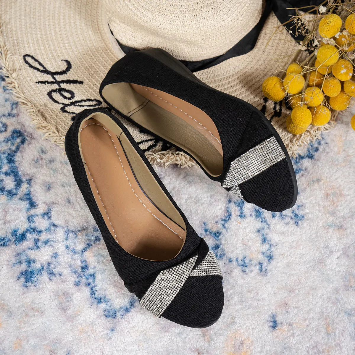 Black women's slip-on casual shoes with a chunky heel and rhinestone decoration on the fabric upper.