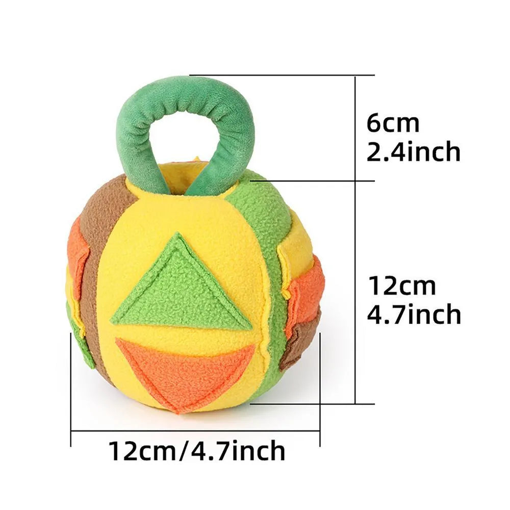Pink and green plush ball dog toy with squeaker and treat pockets on a white background.