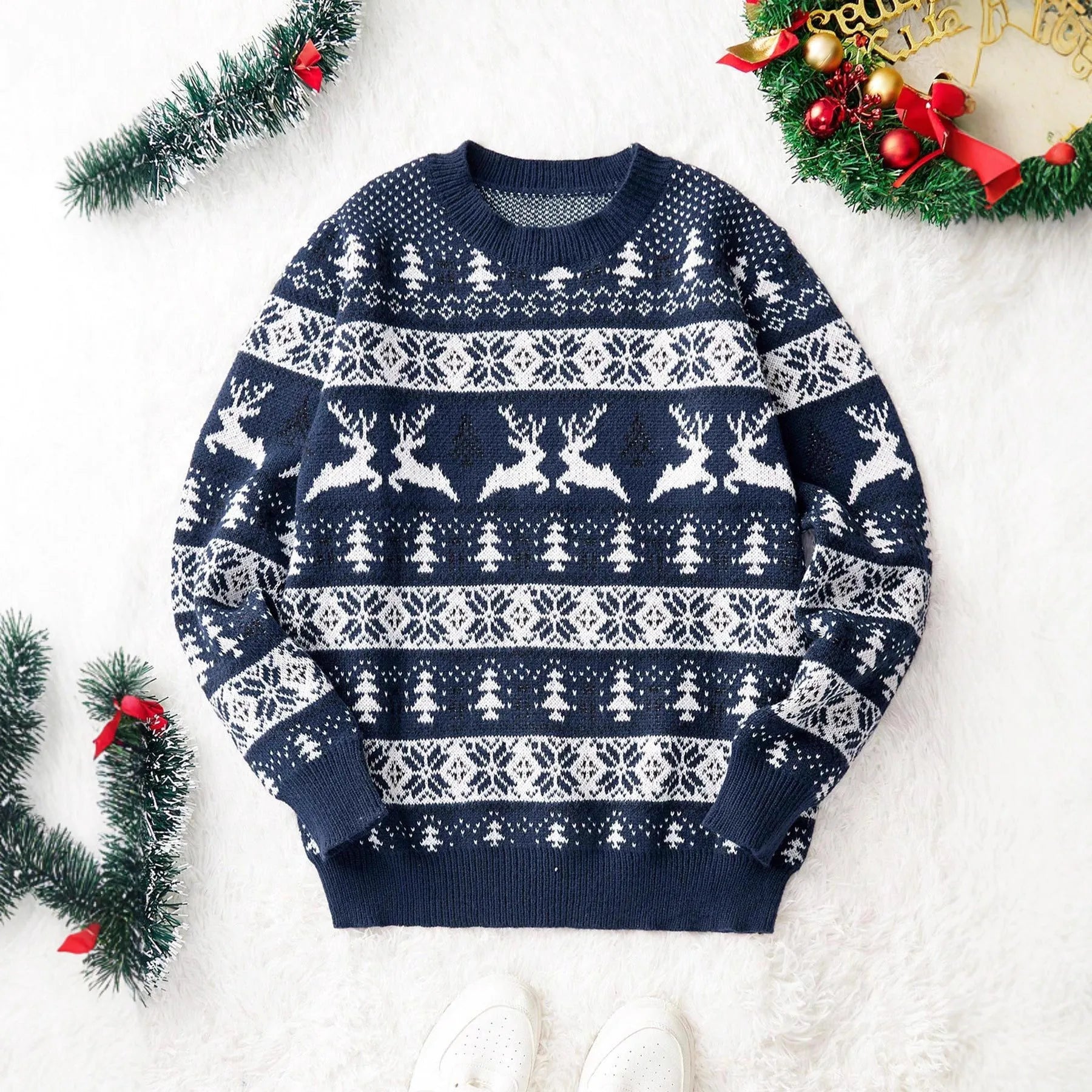 Men's red loose jacquard Christmas sweater with round neck and long sleeves on display