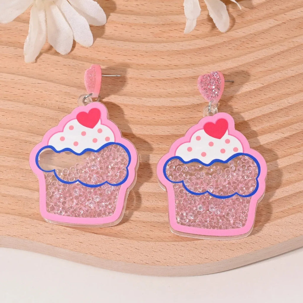 Colourful acrylic fruit and ice cream dangle earrings for women on a white background.