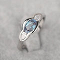 Women's geometric ellipse copper ring with white gold finish and inlaid zircon stones.
