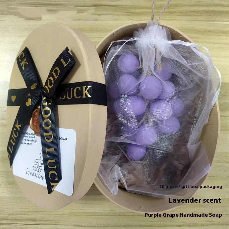 A 120g bar of handmade grape soap with options for black, green, purple, and litchi fragrance.