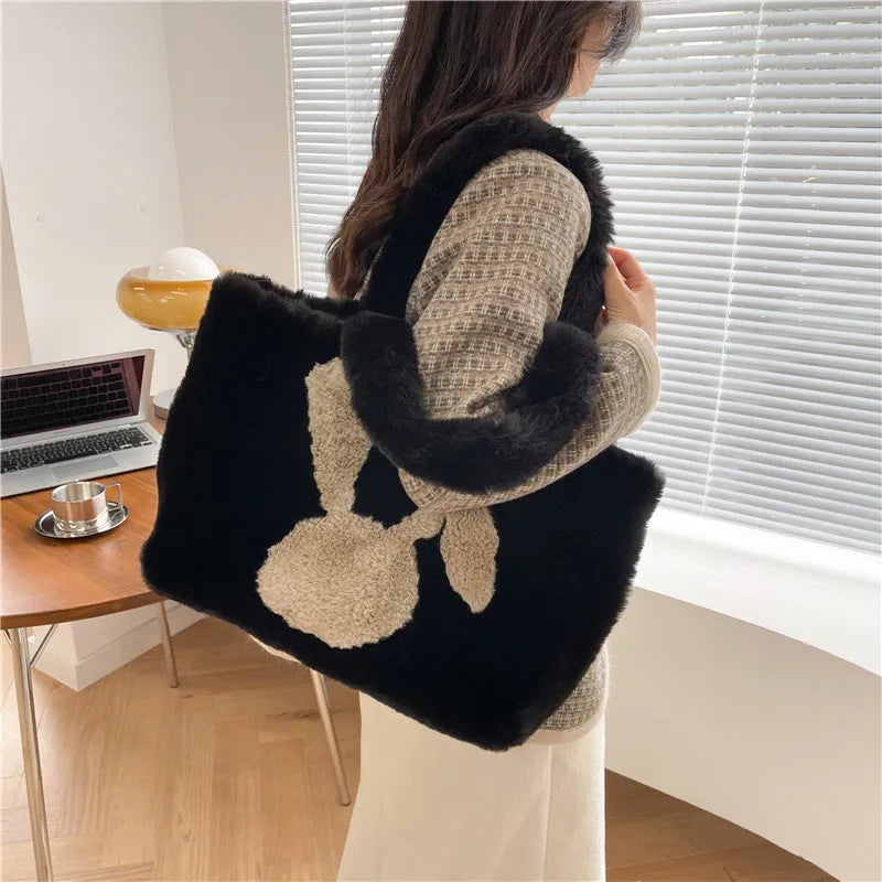 Plush shoulder bag with rabbit ears design in multiple colour options