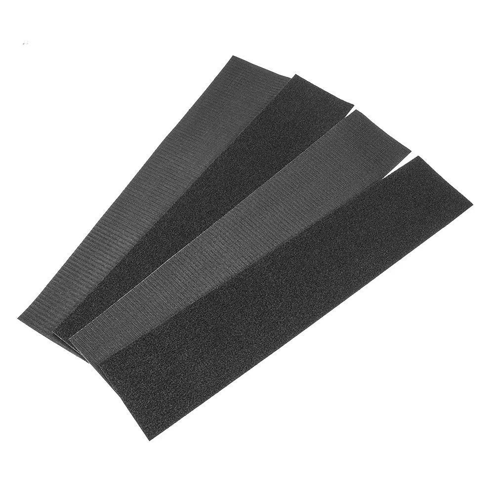 Double-sided adhesive tape for vehicle licence plates showing right-angle shape and Velcro backing