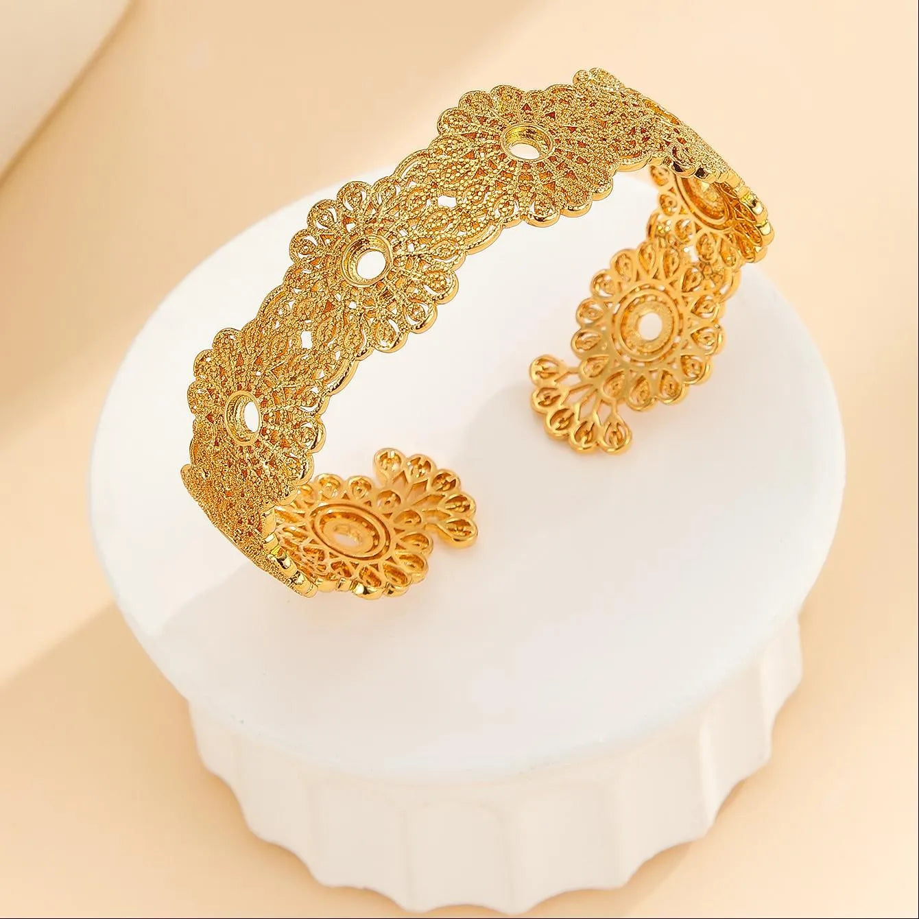 Gold bracelet with hollowed out lace flower design, gold finish, gold plated copper