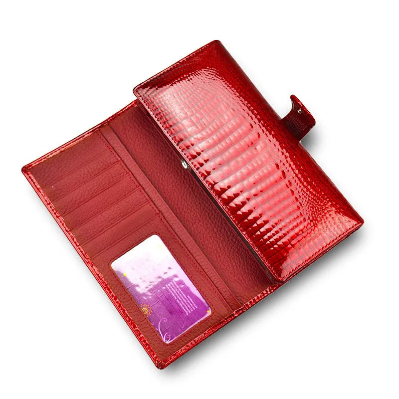 Genuine leather coin purse with patent finish and crocodile pattern in wine red colour