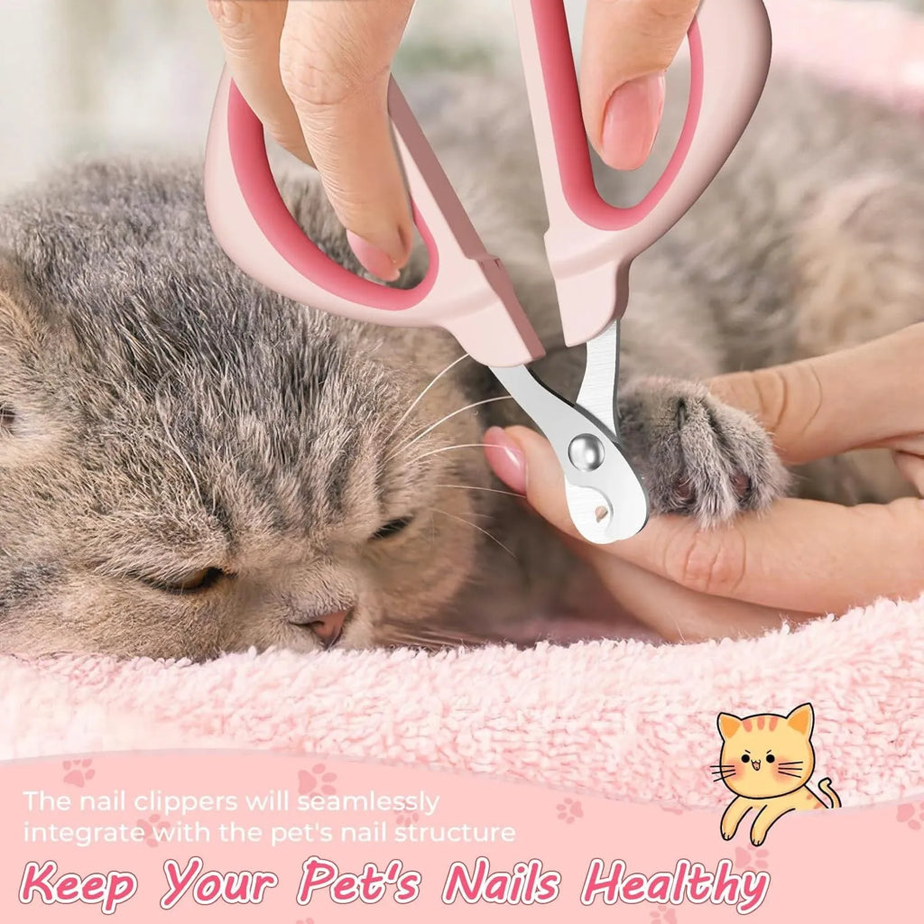 Close-up of a pink pet nail clipper showing the round positioning hole and stainless steel blade.