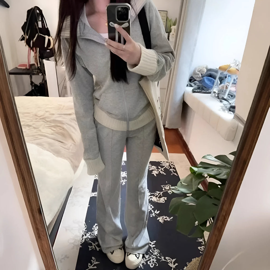 Light gray women's casual two-piece set with coat having pockets and wide leg trousers