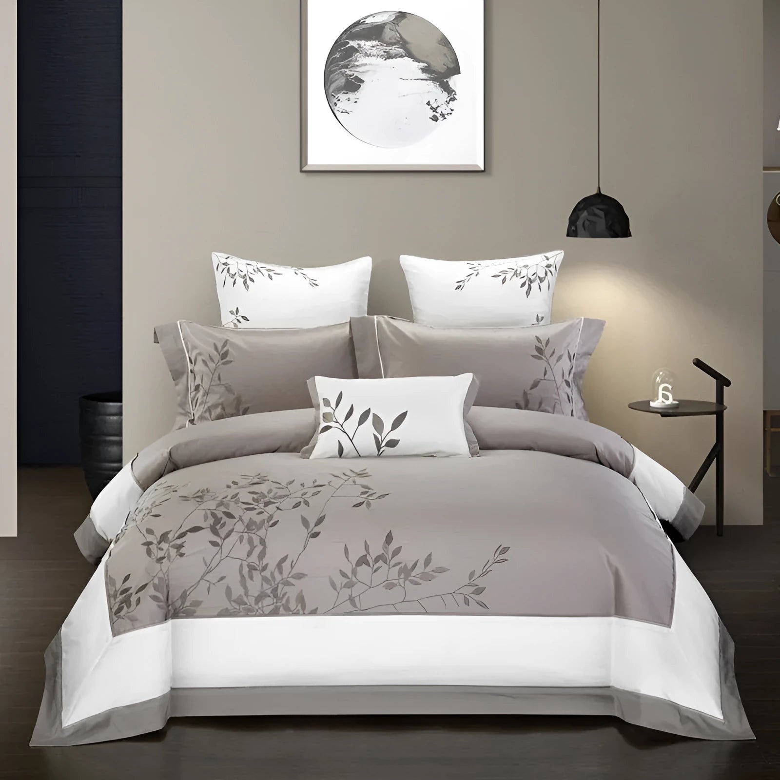 A four-piece cotton bedding set with embroidery, shown in one of five available designs.