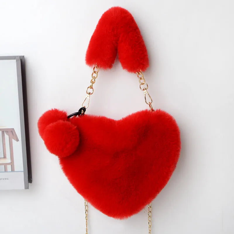 Soft plush heart-shaped women's handbag in medium size with zipper closure