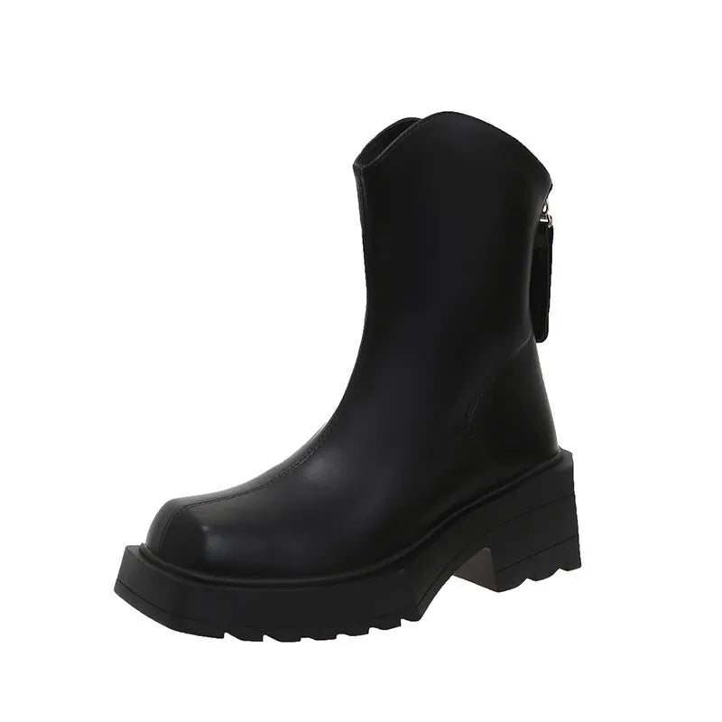Black women's platform Martin ankle boots with a square toe, high heel, and back zipper on a white background.