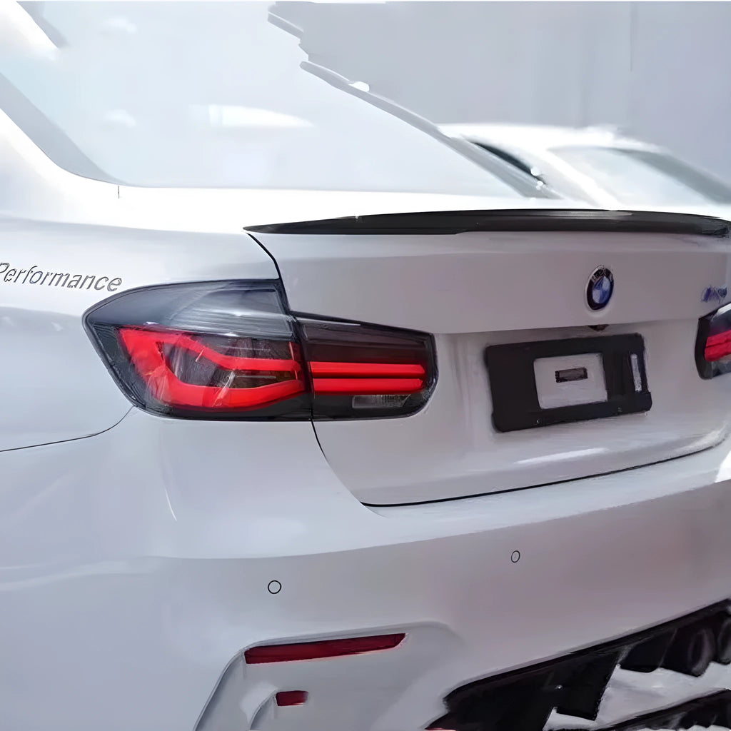 Modified streamer LED tail light assembly for BMW 3 Series 2012-2015 in red or smoked black finish showing ABS housing