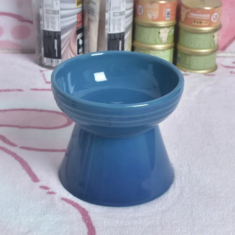 Black ceramic pet bowl with high foot and raised neck for dog or cat feeding