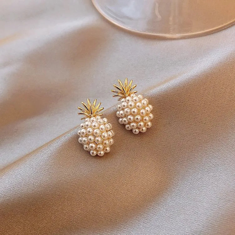 Korean-style alloy fruit earrings with inlaid stones in gold, pearl flower, silver, or starfish pearl finishes.