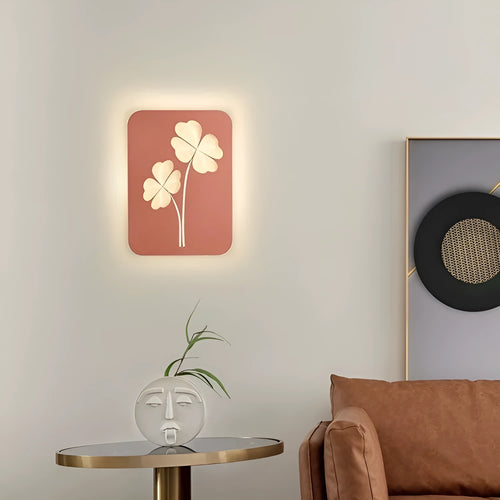 Modern bedside lamp with an acrylic shade showing a love heart motif and three-colour LED light.