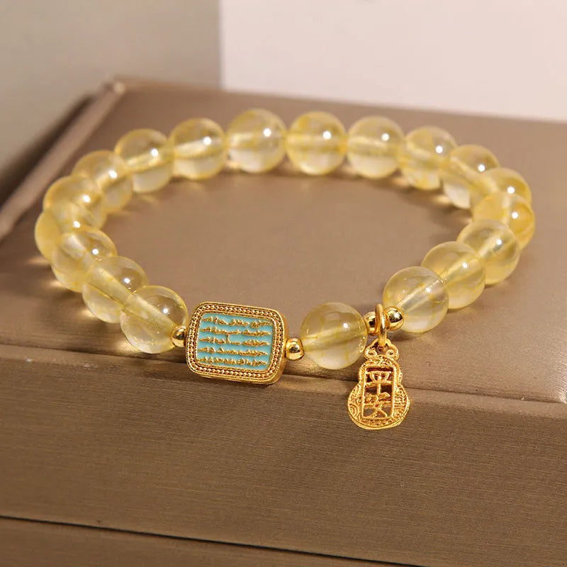Women's yellow citrine crystal bracelet with rhinestones on adjustable 7-inch band