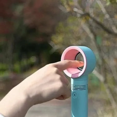 Compact portable bladeless desk fan with USB cable and base, shown in blue.