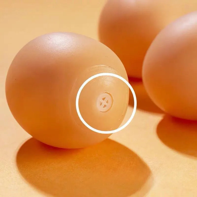 Egg-shaped dog toy with textured surface for tooth cleaning and sound feature