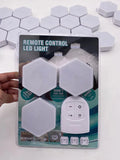 White wireless remote control patch light with touch function, showing compact rectangular design.