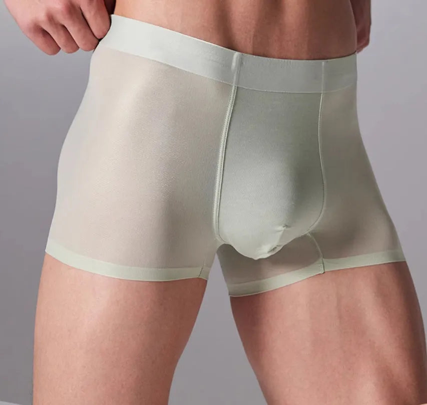 Men's seamless antibacterial fitness underwear shorts in a polyamide spandex blend on a grey background.