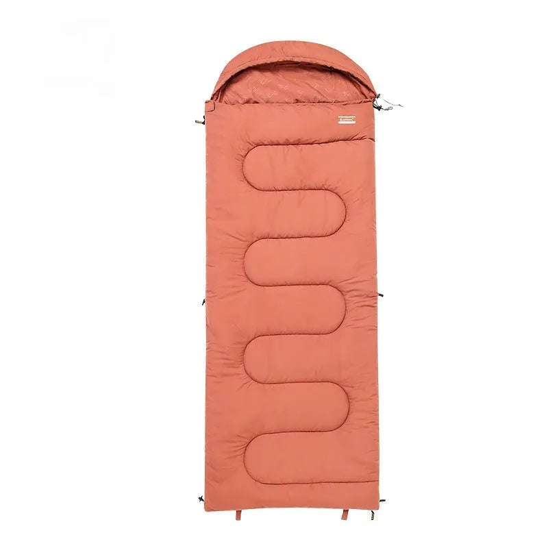 Cotton camping sleeping bag in ochre colour folded to show portable design