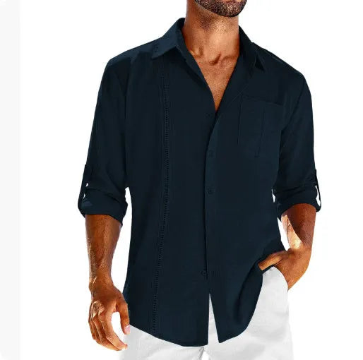 A man's solid-colour long sleeve casual shirt with a polo collar, button front, and chest pocket.