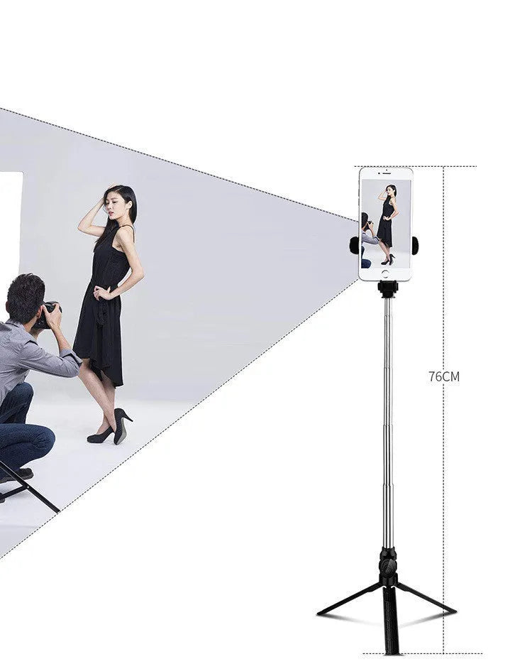Bluetooth remote control mobile phone tripod stand extended with phone attached