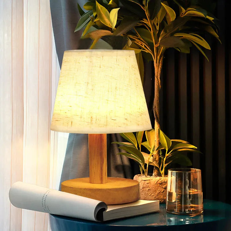 Vintage Korean style pleated table lamp with jute and linen shade and bamboo base.