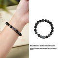 Men's S925 sterling silver bracelet with a black obsidian snake charm on a dark background.
