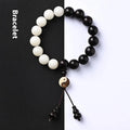 Handcrafted Bodhi seed bracelet with white Corypha Umbraculifera and Blackwood beads in eight-diagram pattern