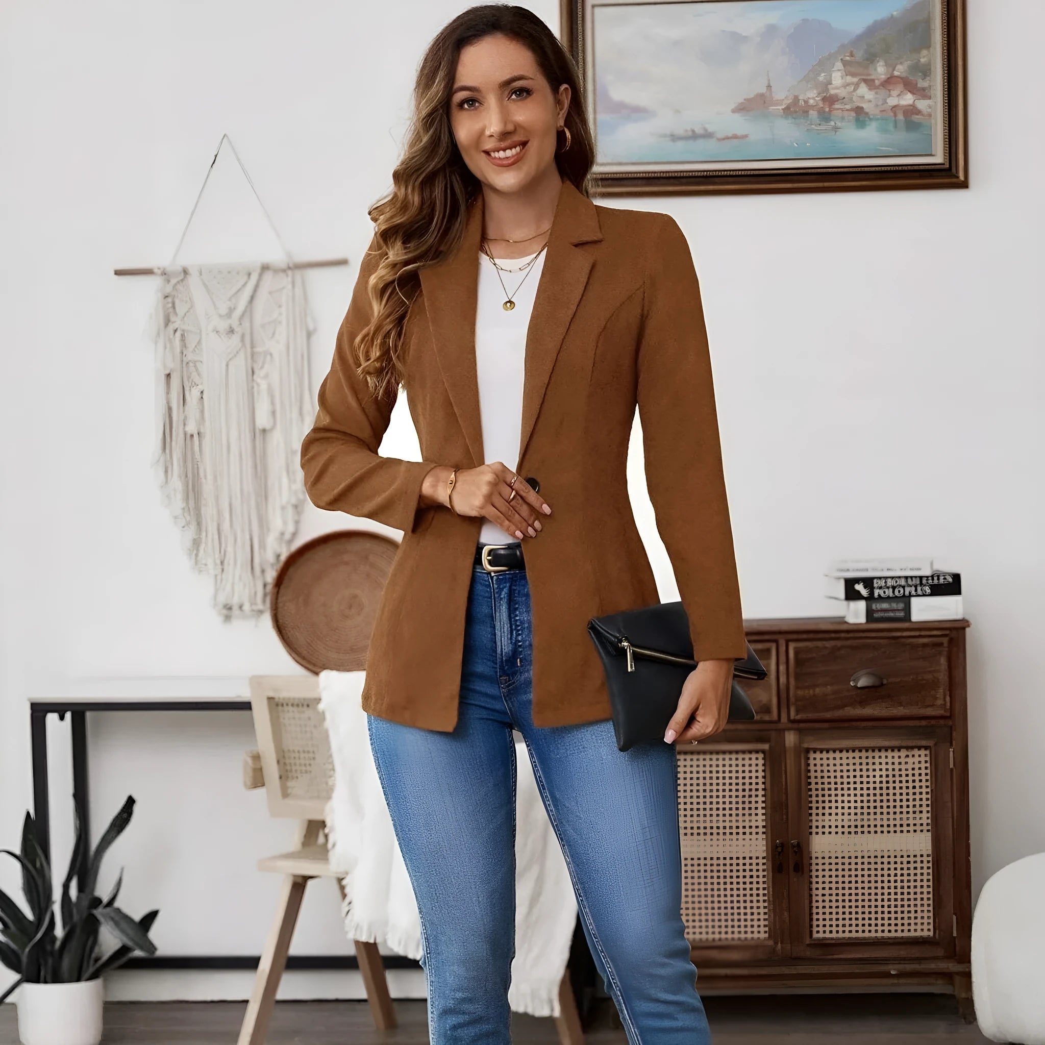 Brown men's single-breasted suit coat with lapels and long sleeves on a hanger