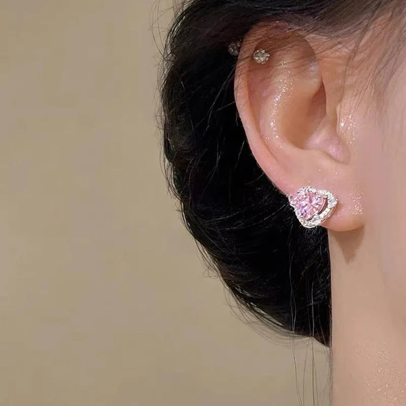 White heart-shaped stud earrings for women with copper construction and electroplated finish