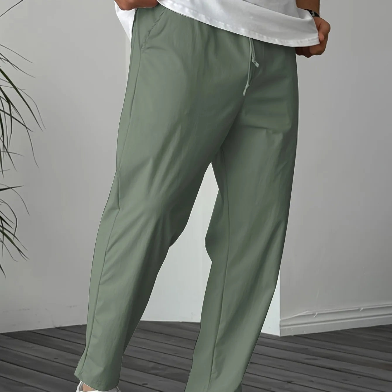 Men's khaki bamboo fibre drawstring trousers with straight leg and ribbon pocket