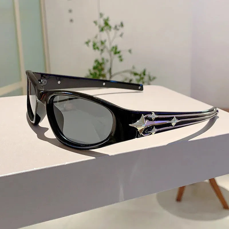 A pair of outdoor sports sunglasses with a PC frame and lens, shown in a black frame with grey lens colour variant.