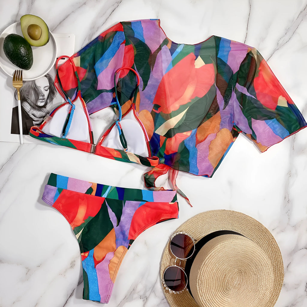 Red women's printed split swimsuit with triangle bikini briefs for swimming and surfing.