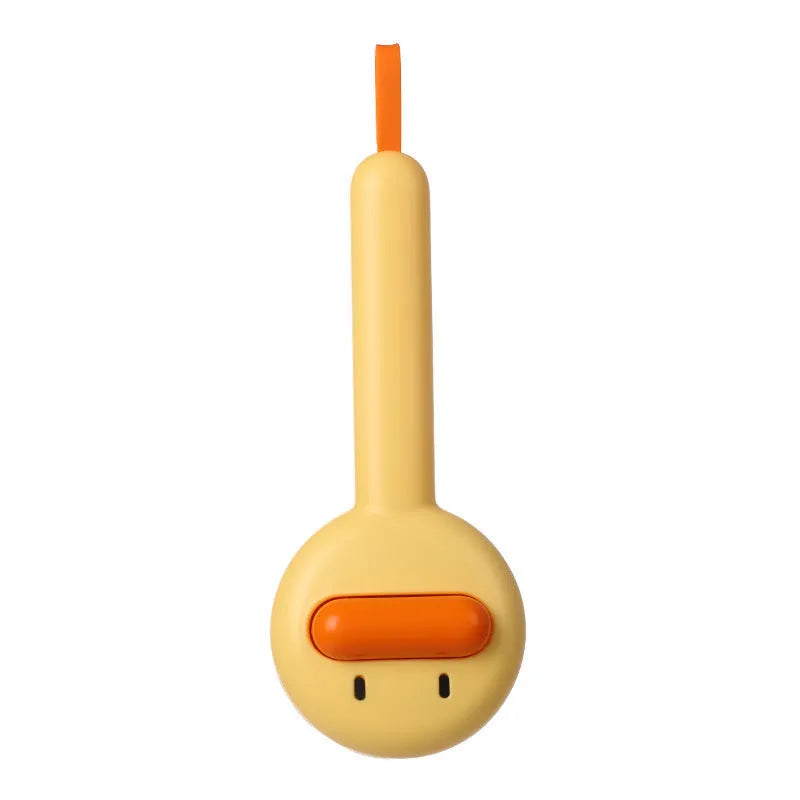 Small yellow duck-shaped pet comb with needle bristles for grooming cats and dogs