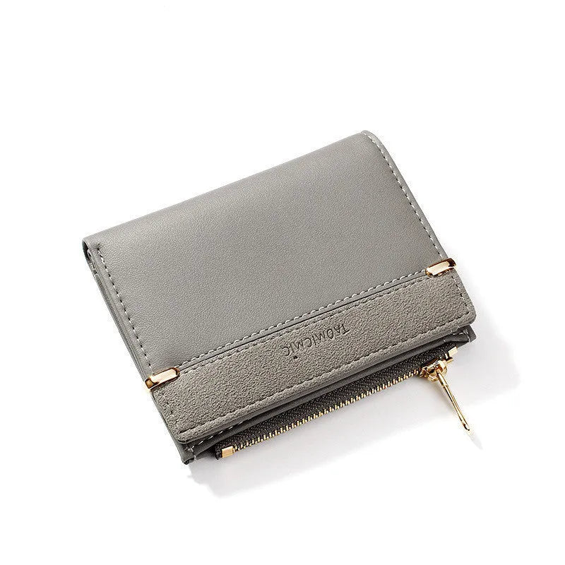 Ladies short zipper wallet in PU leather, open to show multiple card slots, bill holder, change slot, and hidden compartment.