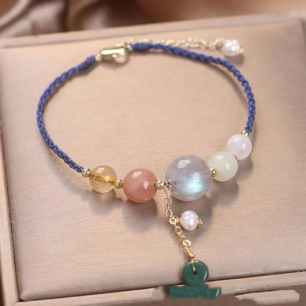 Hand-woven crystal bracelet with sequin details and adjustable buckle in three colour options
