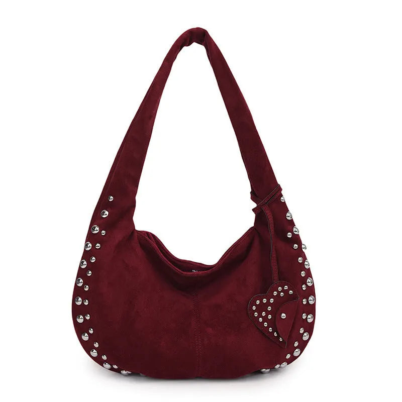 Soft plush retro style tote handbag for women in a choice of colours, shown as a strapless design.