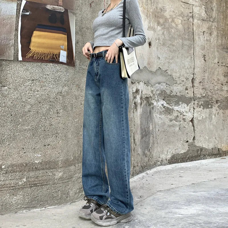 Women's high-waisted straight leg jeans in retro blue denim, shown in cropped and full-length styles.