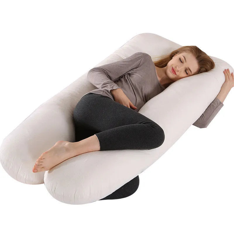Large U-shaped pregnancy support pillow with removable cover in choice of fabrics.